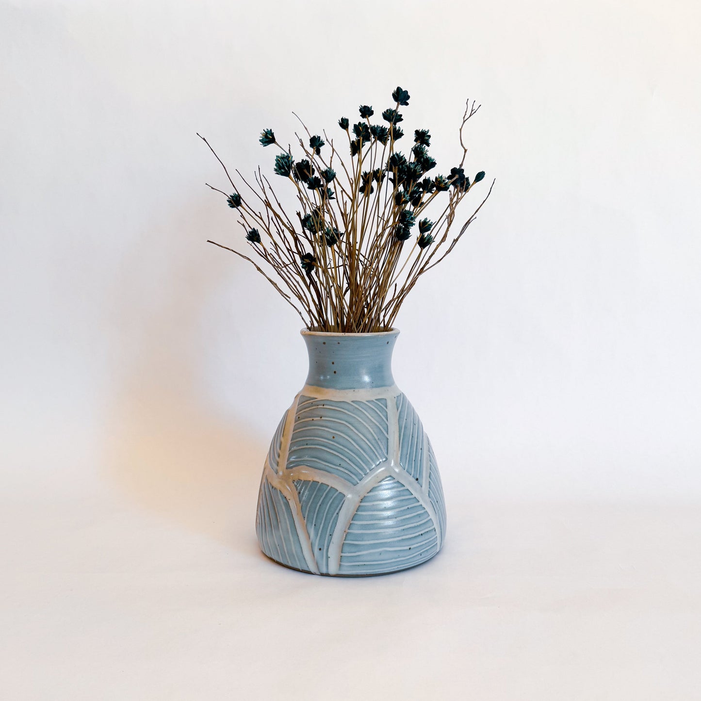 Blue carved vase