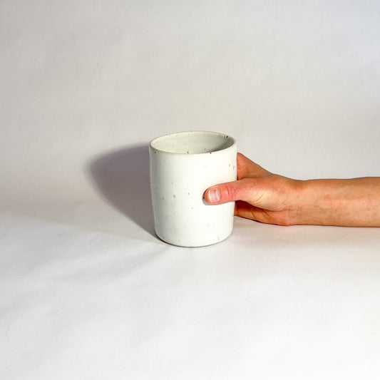 Speckled white thumb tumbler