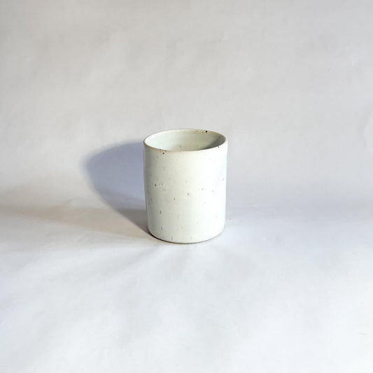 Speckled white thumb tumbler