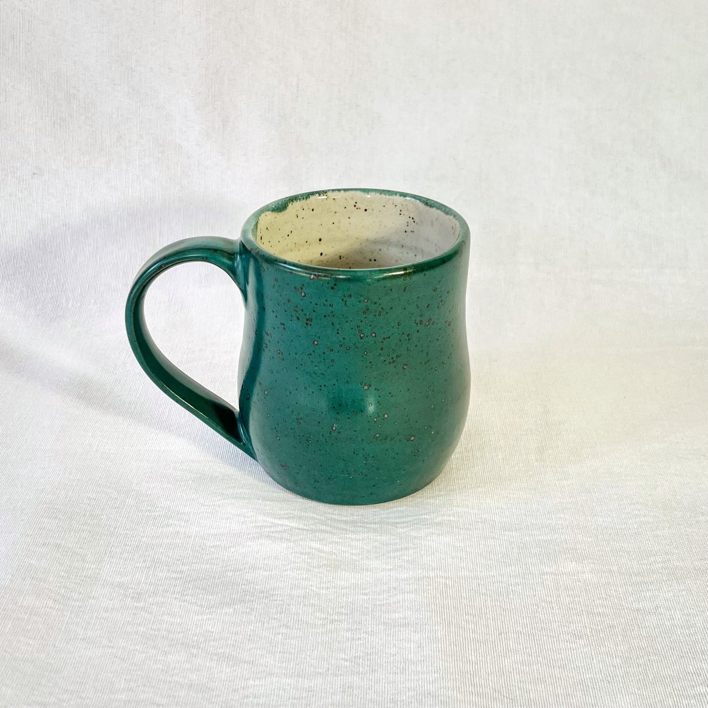Turquoise speckled mug