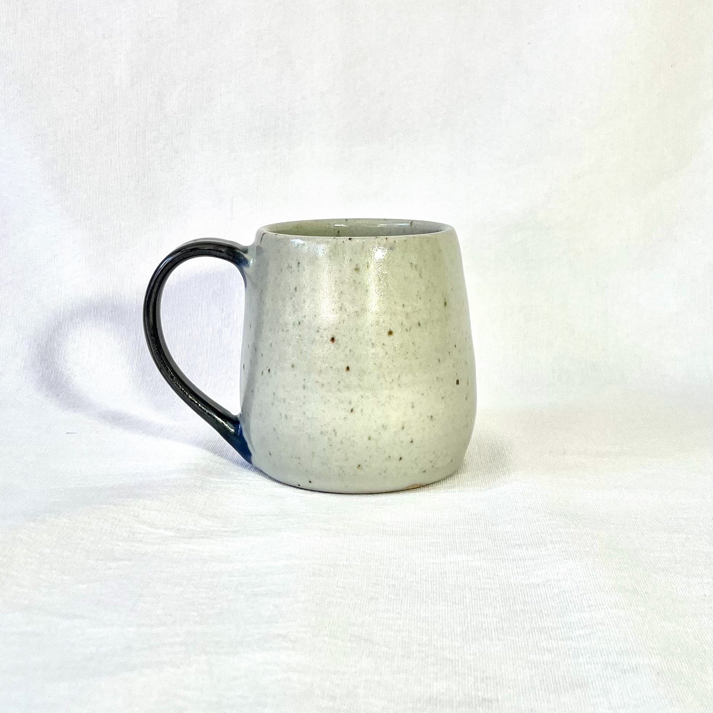 Black-handled mug