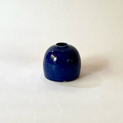 Blue rounded bud vase