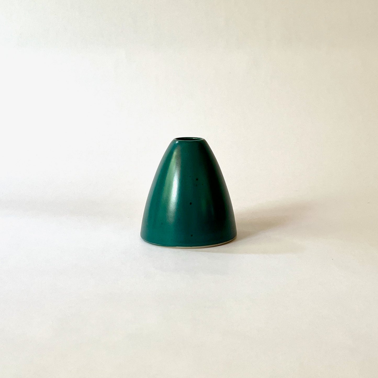 Triangular turquoise bud vase