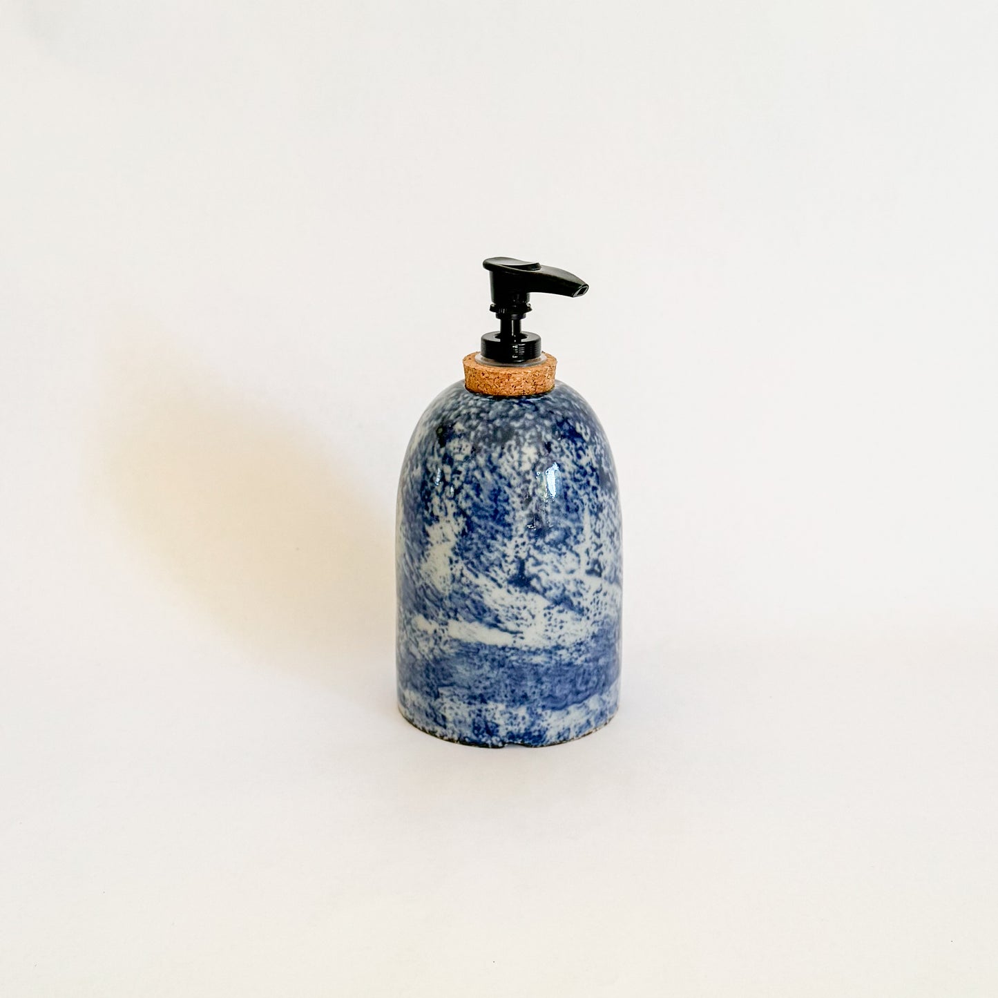 Navy blue soap dispenser